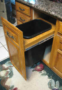 New pull-out trash can adds new life to tired cabinets or replaces worn out appliances.